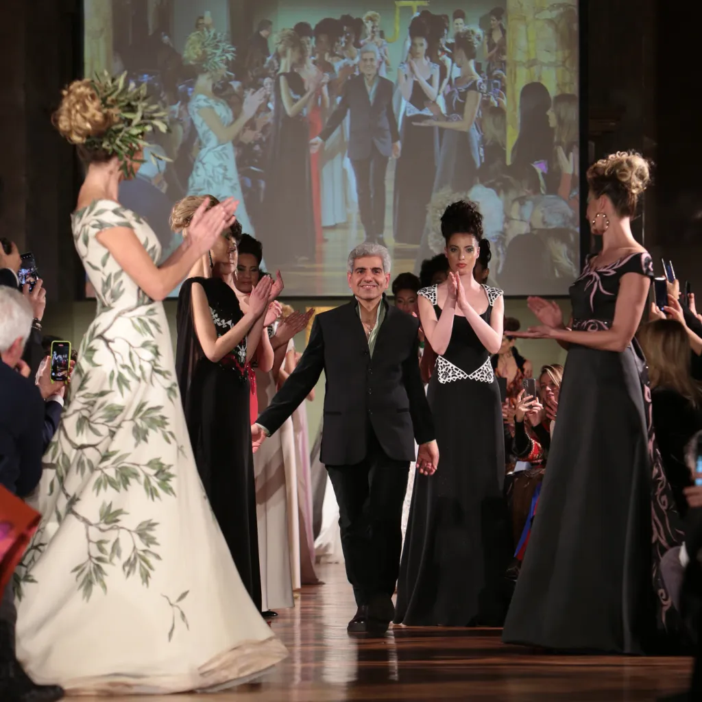 Jamal Taslaq on the runway with his models