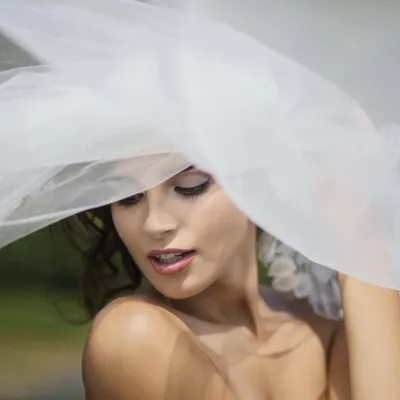 Softness as a language. A white veil, a gentle gaze, a moment suspended between dream and reality. This image speaks be…